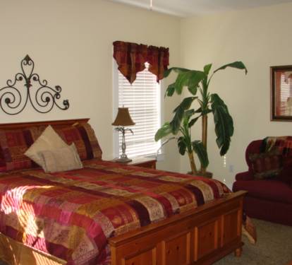 Second floor guest bedroom with queen bed