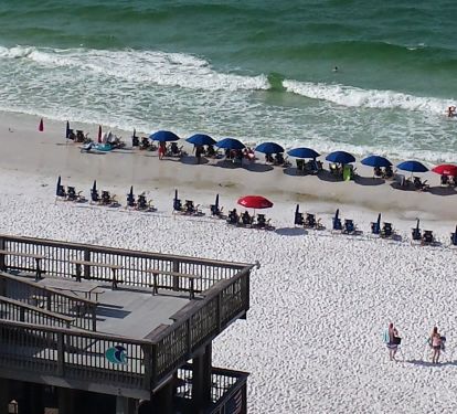 Direct access to the beach and beach bar is provided by a bridge ... safe for kids and adults!  This view from the main Balcony of 801.