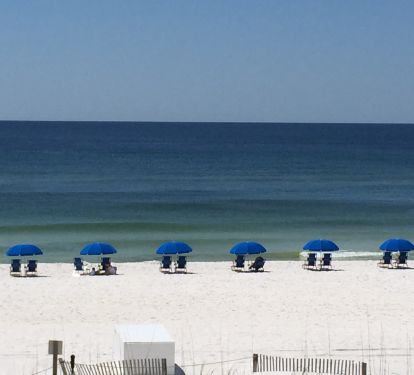 View from the Patio showing complimentary Beach Chairs/Umbrella Service for Guests