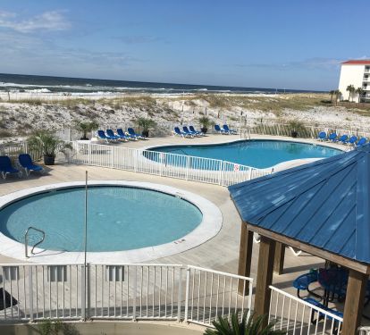 Kiddie pool and one of the 3 large pools on the property