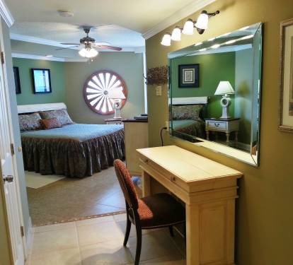 Entrance to the Master Bedroom with a computer/make-up table and chair also a walk-in-closet