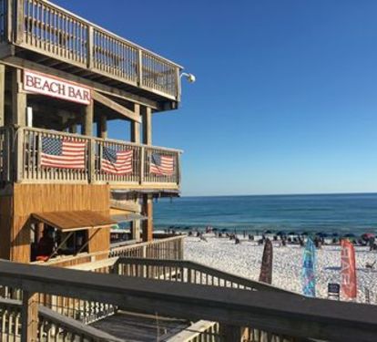 Beach Bar 1st floor of the beach deck. Fun place to have a drink and food