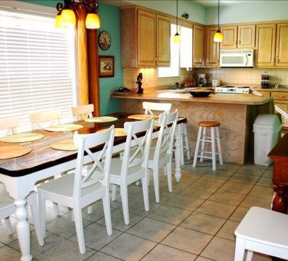 seating for 10 at the dining table, plus 4 at the breakfast bar