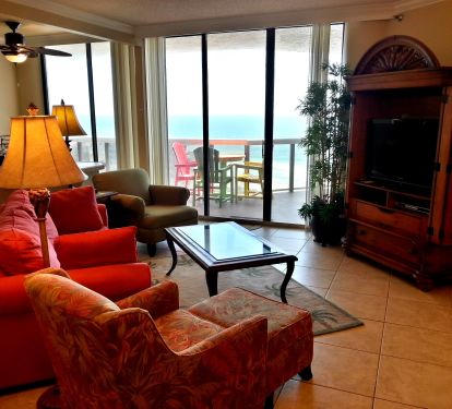 Living Room has a Queen sized sleeper sofa, 2 chairs, Flatscreen TV/DVD Player, iPOD Player  Balcony Access