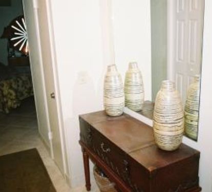 Entrance to the Master Bedroom. Use this entry table as a makeup area. If you have to work a little this table is perfect!  Lots of light.
