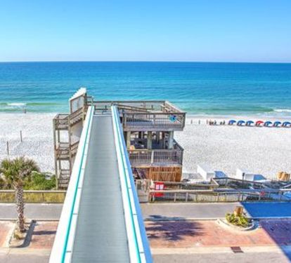 Sky Bridge goes over the street takes you to the Pristine white sandy beach and beautiful waters of the Gulf of Mexico. Voted one of the world's top 10 Beaches. 
