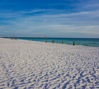 Beautiful beach in front of waterscape.