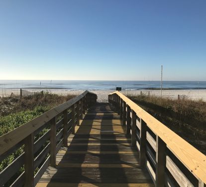 Boardwalk from the building to the beach