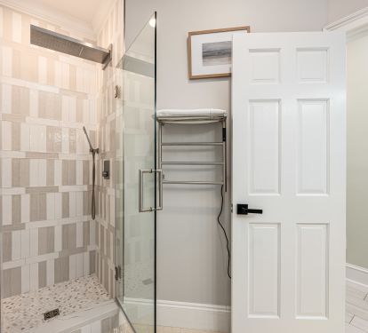 Convenient bathroom next to the green bedroom with a TOTO Washlet.