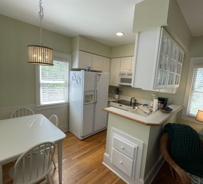 Kitchen and dining are simple, but cute &amp; complete with all the necessities