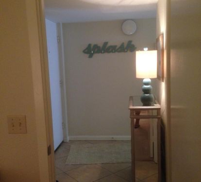Front entry. Towel rack for beach towels