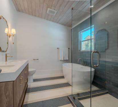 Primary suite 1 ensuite bath with large shower, double vanity and soaking tub