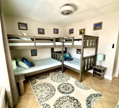 Main Floor Guest Bedroom-4 XL Twin Bunk Beds with Walk In Closet-Smart TV