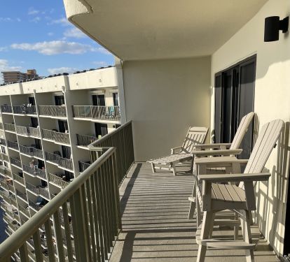 Lounge on the chaise or enjoy the view from the bar height Polywood chairs. 