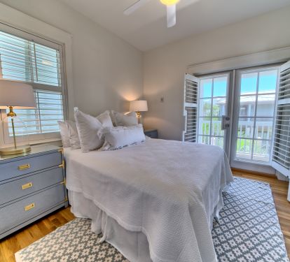 2nd Floor Queen Bedroom with balcony and full bathroom. 