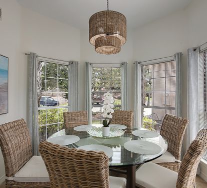 A lot of natural light in the dining area.