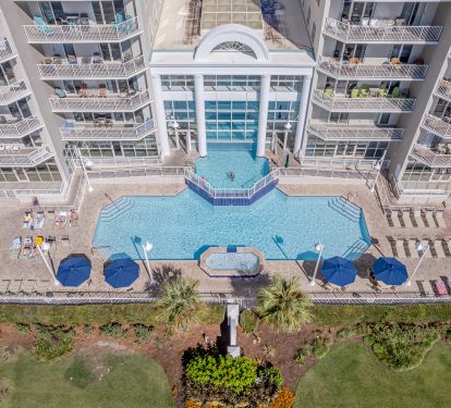 Drone view of the pool and hot tubs