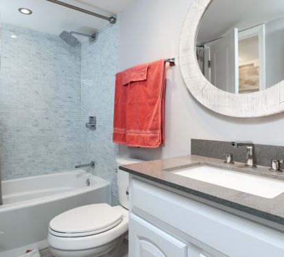 The second bathroom is between the bunk room and the main bedroom. 