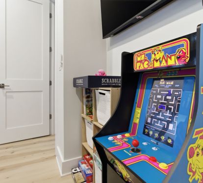 Fun arcade game in the bunk room