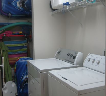 Washer, Dryer, chairs, cooler, umbrellas, etc. in condo for guest use