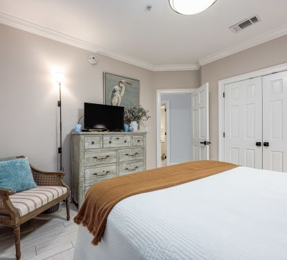 Cozy retreat with warm colors and inviting textures&mdash;perfect for unwinding after a day at the beach.