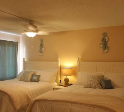 Two comfy Queen Beds in Master BR