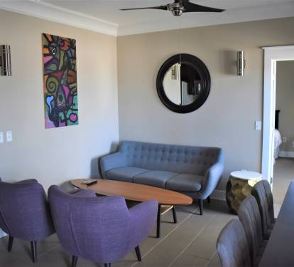 2ND FLOOR LIVING AREA, DINING, &amp; FULL KITCHEN - OPENS TO GULF FRONT BALCONY