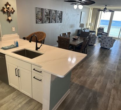 Newly remodeled kitchen with quartz countertops