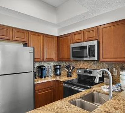 Cook a Meal or Enjoy Some Drinks or Coffee in the Fully Stocked Kitchen