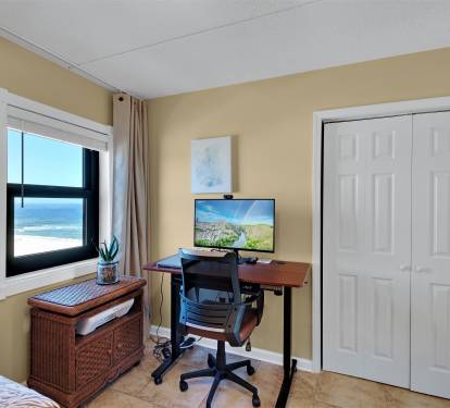 Twin BR adjustable height desk w/ combo tv/gaming monitor w/view.