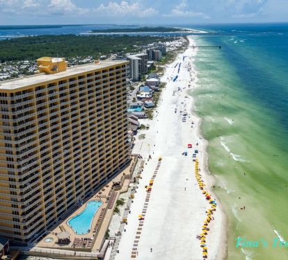 From the air-our balcony 120 ft long heated pool on the beach and Gulf of Mexico