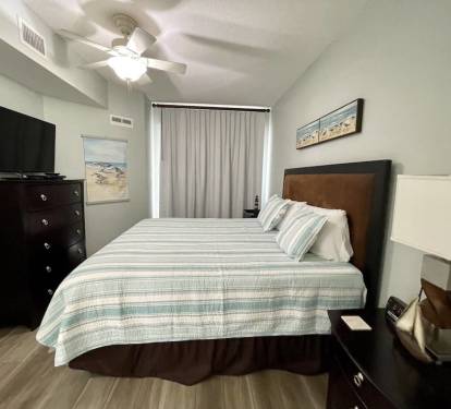 Master bedroom with king bed opens to balcony with gulf view