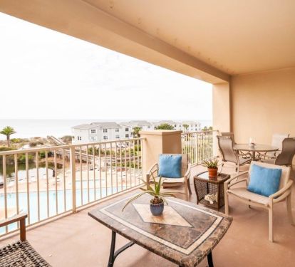 Our 350 sq. ft balcony overlooking the pool, natural pond and Gulf of Mexico