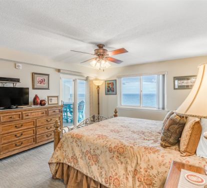 Grand Master Suite with Balcony Access. Unobstructed Views of the Gulf