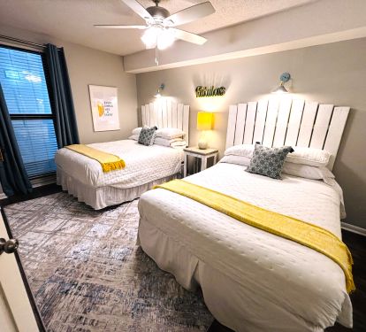 Guest bedroom has TWO queens &amp; storage in the closet.