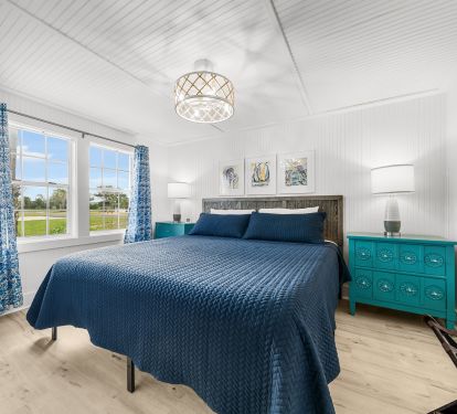 Locked within a hall off the kitchen, another king bedroom.