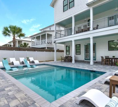 Windsong-6 The splash deck creates a relaxing way to keep cool while enjoying the Sunshine State. 5 burner outdoor grill is ready for your freshly caught seafood.
