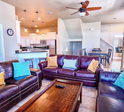 Living room with an access to the balcony on the second floor