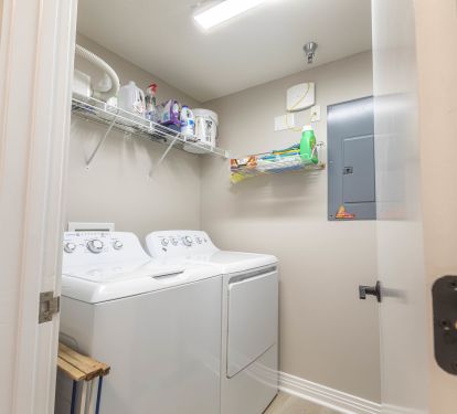 Private laundry room in unit.  Starter supply of laundry soap provided