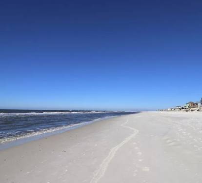 beautiful, uncrowded,  white sand beach awaits!