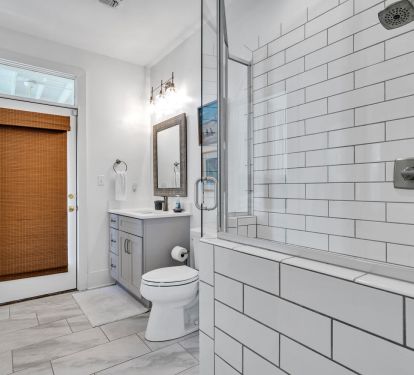 Recently renovated hall bath with bedroom/outdoor access