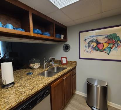 Kitchen with beach view and all dishes, utensils, cookware