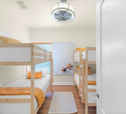Shipwatch-21...1st floor. Bedroom 3. Photo 1. Two twin over twin bunks with wall mount TV. Sleeps 4.