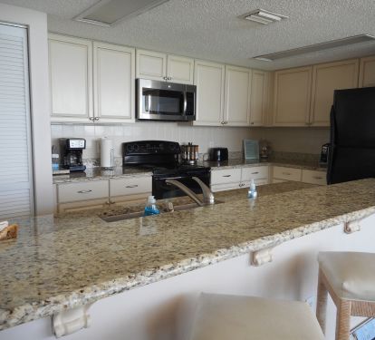 BAR STOOLS AND GRANITE COUNTER FOR EXTRA SEATING