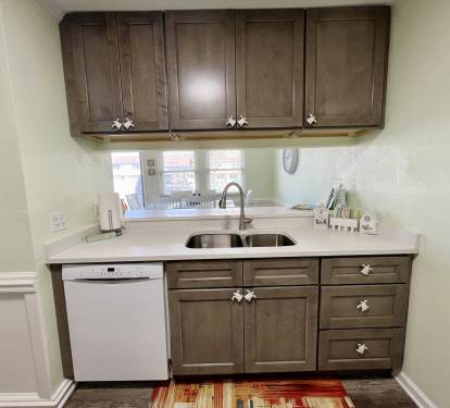 The pass through over the sink allows for easy conversation.