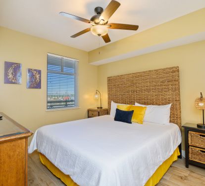 Here's the second king suite with a private full bathroom and coastal vibe