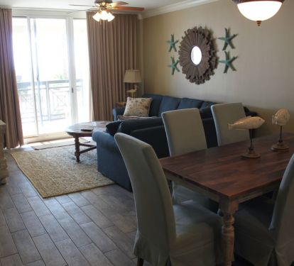The floor looks like weathered hardwood, but its actually tile