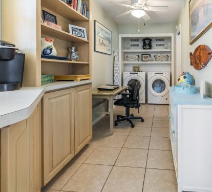 Coffee bar, pantry, office desk and laundry area