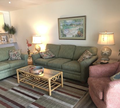  The roomy living room offers a sleeper sofa and plenty of comfortable seating.