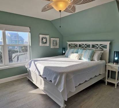 upstairs king master 1 with covered ocean view balcony and ensuite bath